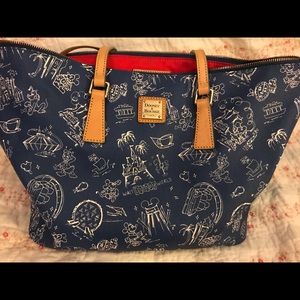Blue Disney World attractions Dooney and Bourke tote